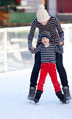 Image showing family ice skating