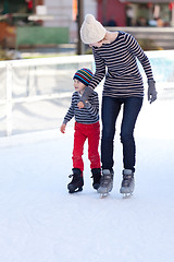 Image showing family ice skating