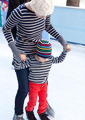 Image showing family ice skating