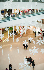 Image showing Blurred people in shopping center on christmass. 