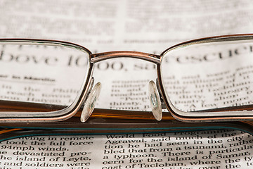 Image showing Glasses on newspaper