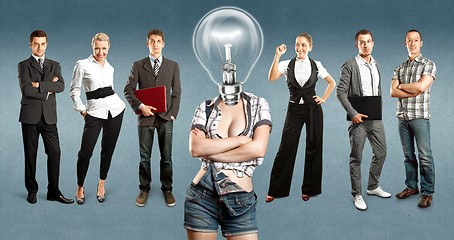 Image showing Business Team With Lamp Head