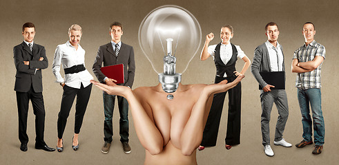 Image showing Business Team With Lamp Head