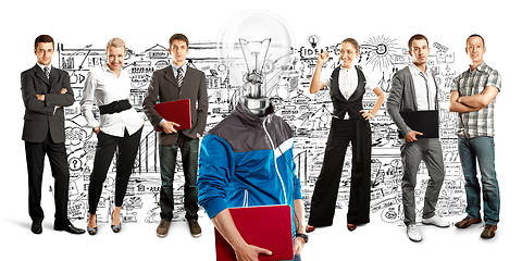 Image showing Business Team With Lamp Head