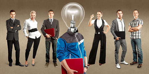 Image showing Business Team With Lamp Head