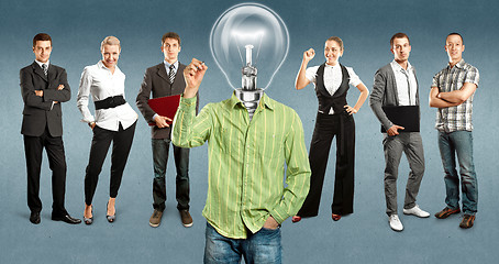 Image showing Business Team With Lamp Head