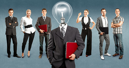 Image showing Business Team With Lamp Head