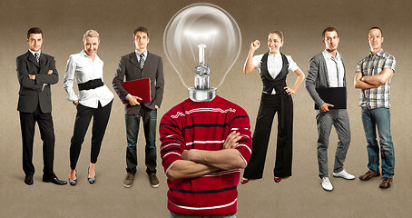 Image showing Business Team With Lamp Head