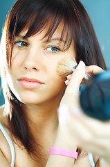 Image showing Girl doing makeup