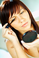 Image showing Girl doing makeup