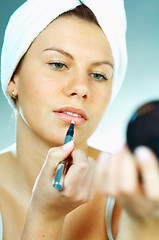 Image showing Girl doing makeup