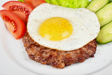 Image showing steak beef meat with fried egg