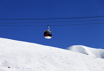 Image showing Gondola lift and off piste ski slope