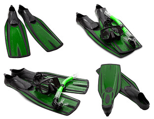 Image showing Set of green flippers, mask, snorkel for diving with water drops