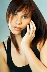 Image showing Woman talking cell phone