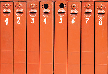 Image showing eight old mail boxes background