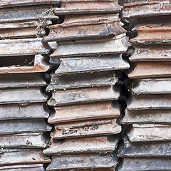 Image showing Pile of brown hearth tiles