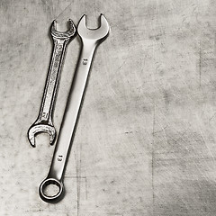 Image showing Spanners, wrenches on a metal plate