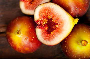 Image showing fresh figs over old wood