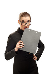 Image showing Business woman with clipboard isolated on white