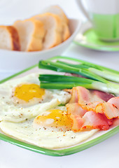 Image showing breakfast with bacon and fried eggs