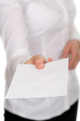 Image showing woman gives a white envelope