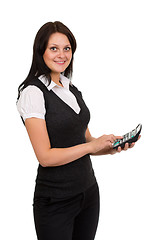 Image showing Beautiful smiling girl with a calculator in hand