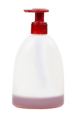 Image showing Cosmetic bottle with red cap