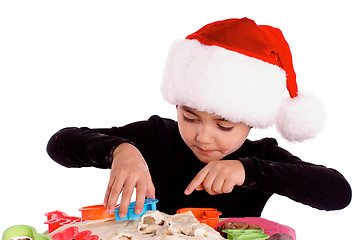 Image showing Little Santa Cooking