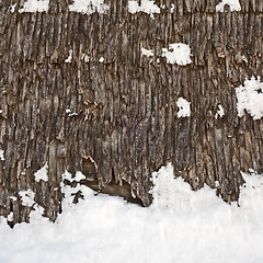 Image showing plank wall of old wind mill background, winter time, snow on the