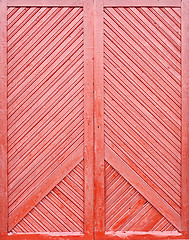 Image showing red wooden plank door