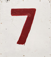 Image showing number seven on white plywood board