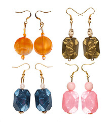 Image showing Pearlescent earrings different on white background