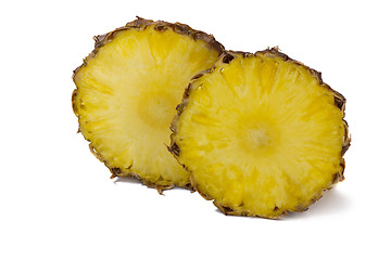 Image showing Cut off from the pineapple slices on white background.