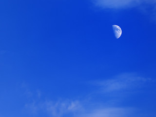 Image showing Evening blue sky with moon in corner