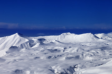 Image showing Snowy plateau and blue sky