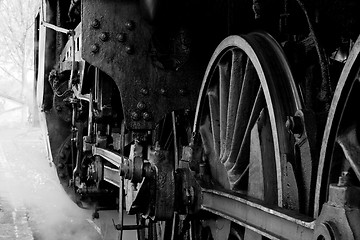Image showing Wheels of an old steam locomotive