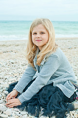 Image showing pretty girl at the autumn beach 