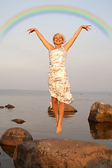 Image showing flight under rainbow