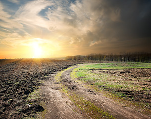 Image showing Country road and plowed land