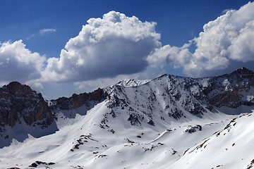 Image showing Snowy mountains and blue sky with cloud in sun day