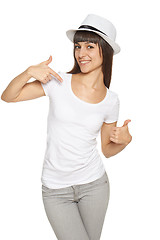 Image showing Woman pointing at herself and showing thumb up