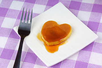 Image showing Mini heart-shaped pancake with syrup