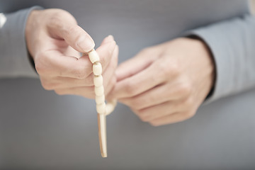 Image showing Hands with rosary beads