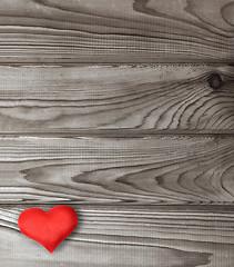 Image showing red heart on dark wooden planks