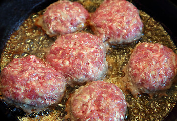 Image showing cutlets are fried in pan