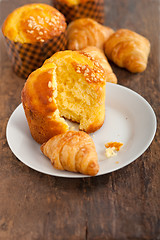 Image showing fresh baked muffin and croissant mignon