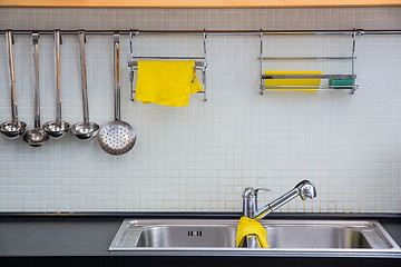 Image showing Clean dishwasher at the kitchen