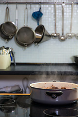 Image showing Saucepan on the plate