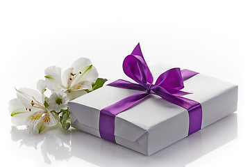 Image showing gift box and flowers